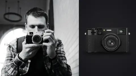 Fujifilm X100VI product photo beside man in black and white photographing with a compact fixed-lens camera in an archway