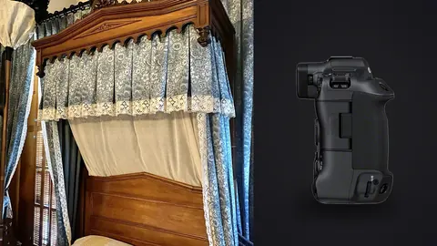 Canon EOS R3 product photo beside antique four poster bed with a patterned canopy and lace trim