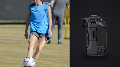 Canon EOS R3 product photo beside soccer player dribbling a ball on a training pitch