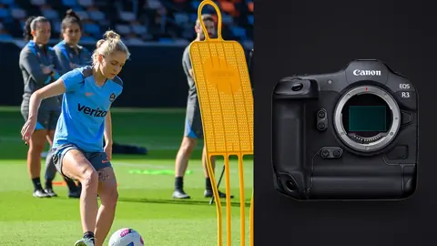 Canon EOS R3 product photo beside soccer players running a cone drill on grass
