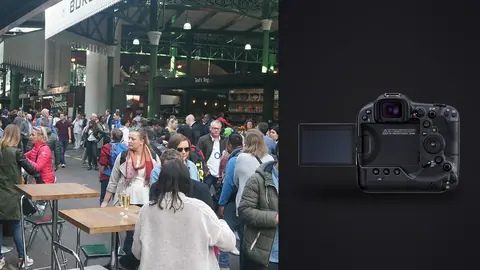 Canon EOS R3 product photo beside crowd browsing stalls under a covered market roof