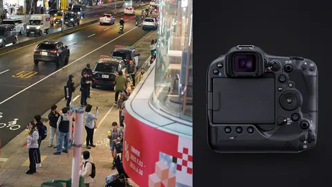 Canon EOS R3 product photo beside police and pedestrians on a rainy city street at night