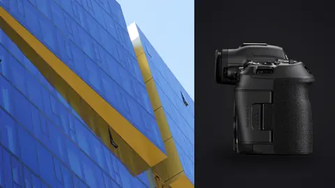 Canon EOS R5 Mark II product photo beside blue glass building with bold diagonal yellow accent