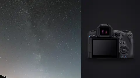 Canon EOS R5 Mark II product photo beside milky way over a coastal hillside with light trailing stars