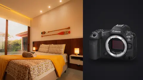 Canon EOS R5 Mark II product photo beside bright bedroom with mountain view and bird art