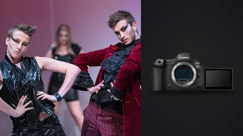 Canon EOS R5 Mark II product photo beside models in dramatic leather and velvet outfits posing on stage