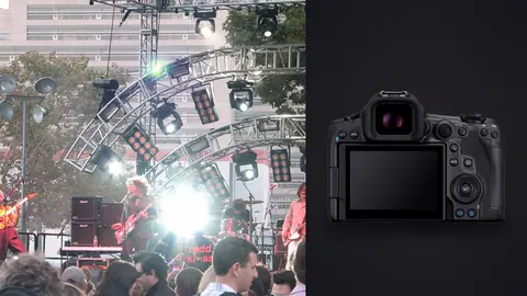 Canon EOS R5 Mark II product photo beside musicians performing on outdoor stage with crowd