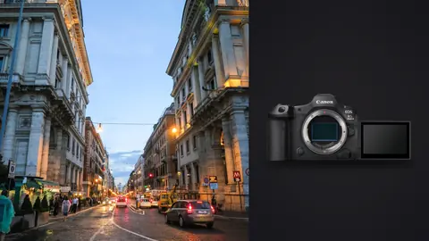 Canon EOS R5 Mark II product photo beside rome street at dusk with pedestrians and traffic between grand buildings