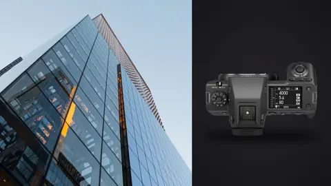 Fujifilm GFX100 II product photo beside glass skyscraper corner with golden sunset reflections