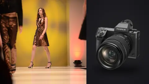 Fujifilm GFX100 II product photo beside model in a bronze metallic dress walking a runway