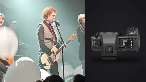 Fujifilm GFX100 II product photo beside three musicians performing on stage