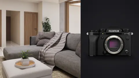 Fujifilm X-T5 product photo beside living room with grey sectional sofa and ottoman