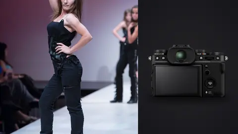 Fujifilm X-T5 product photo beside model in a black strappy dress posing on a runway