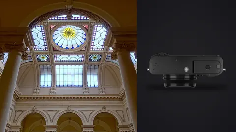 Fujifilm X100VI product photo beside domed stained glass ceiling with ornate columns