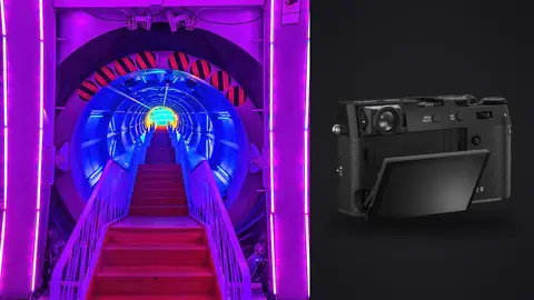 Fujifilm X100VI product photo beside corridor with purple neon lighting and illuminated staircase