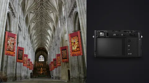Fujifilm X100VI product photo beside gothic cathedral nave hung with colorful red banners