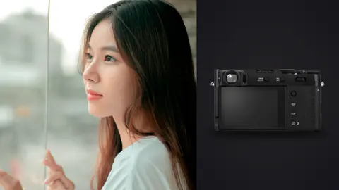 Fujifilm X100VI product photo beside profile portrait by window in white shirt
