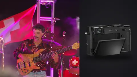 Fujifilm X100VI product photo beside bassist performing on stage with red flag backdrop