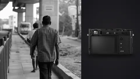 Fujifilm X100VI product photo beside two men walking together along a city street