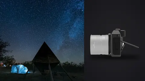 Hasselblad X2D 100C product photo beside milky way over a lit dome tent at a desert campsite
