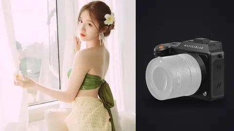Hasselblad X2D 100C product photo beside woman in strapless top by window, back turned