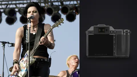 Hasselblad X2D 100C product photo beside guitarist performing on outdoor stage