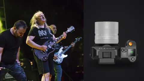 Hasselblad X2D 100C product photo beside musicians performing together on stage