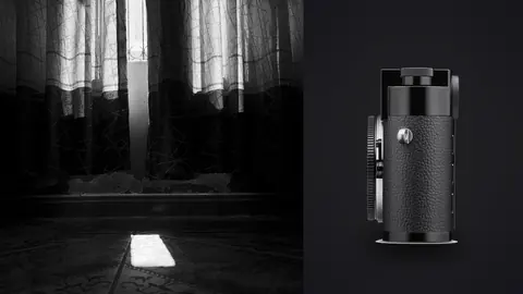 Leica M11 product photo beside black and white curtain silhouette with floor light beam