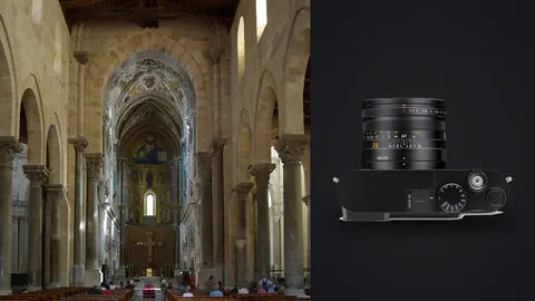 Leica Q3 product photo beside romanesque cathedral nave with golden byzantine mosaic apse