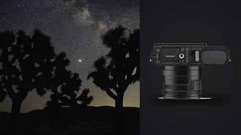 Leica Q3 product photo beside milky way over silhouetted joshua trees in the desert