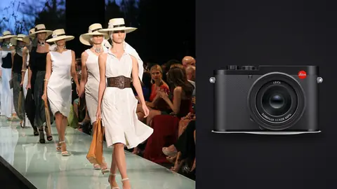 Leica Q3 product photo beside models in white dresses and straw hats walking a runway