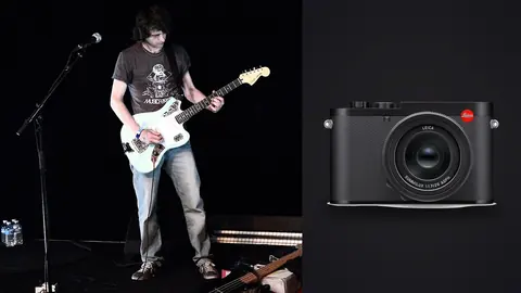 Leica Q3 product photo beside guitarist performing on stage
