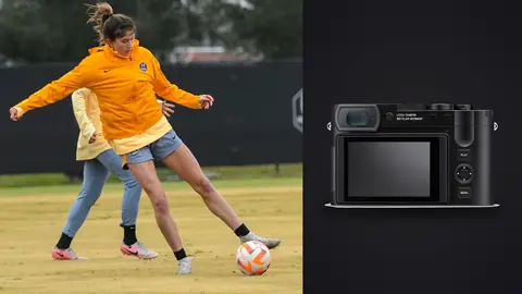 Leica Q3 product photo beside soccer player striking a ball during a training drill