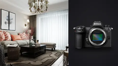 Nikon Z6 III product photo beside living room with grey sofa, chandelier and sheer curtains