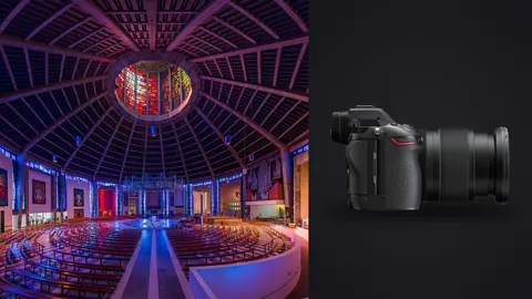 Nikon Z6 III product photo beside circular modernist cathedral with dramatic purple lighting