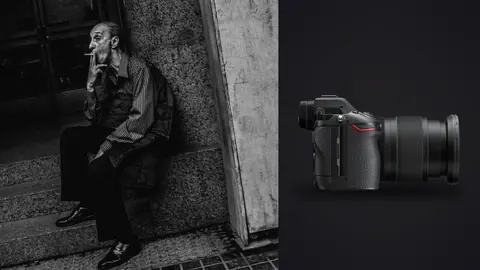 Nikon Z6 III product photo beside elderly man smoking a cigarette on a stone stoop