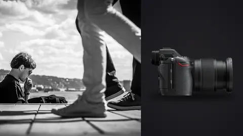 Nikon Z6 III product photo beside low angle of pedestrians legs and a crouching child