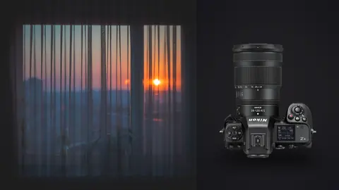 Nikon Z8 product photo beside sunset silhouette through sheer curtain window