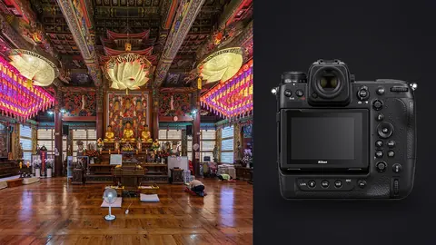 Nikon Z9 product photo beside ornate temple hall with colorful lanterns and gilded altar