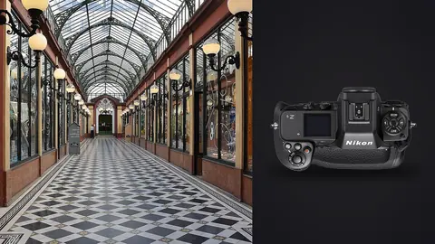 Nikon Z9 product photo beside elegant glass-roofed shopping arcade with checkered floor