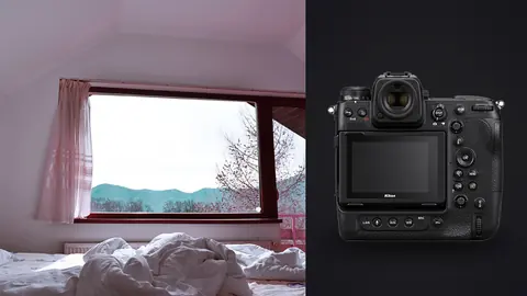 Nikon Z9 product photo beside pink toned room with mountain view through window