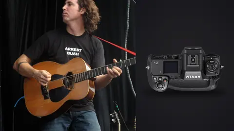 Nikon Z9 product photo beside guitarist performing on outdoor stage