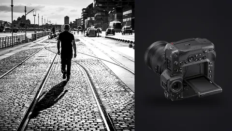 Nikon Z9 product photo beside silhouetted figure walking along tram tracks