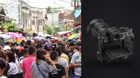 Nikon Z9 product photo beside dense crowd of shoppers on a covered market street