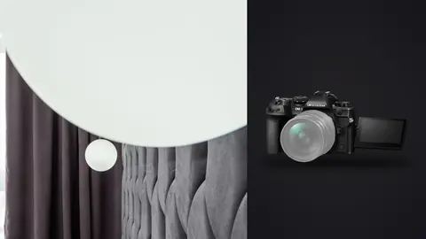 OM System OM-1 Mark II product photo beside round mirror and curtain by tufted headboard, close-up