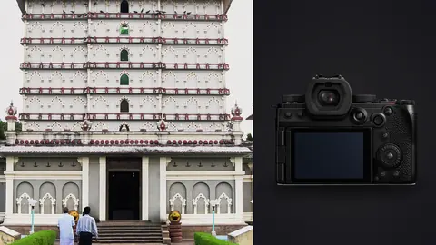 Panasonic Lumix S5IIX product photo beside multi-tiered temple-style gallery building with symmetrical facade