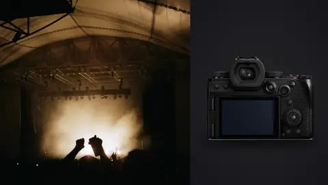 Panasonic Lumix S5IIX product photo beside silhouettes of crowd with hands raised at concert