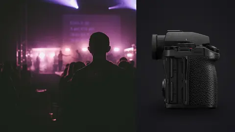Panasonic Lumix S5IIX product photo beside crowd watching concert under pink stage lights
