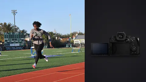 Panasonic Lumix S5IIX product photo beside athlete running alone across an open grass field
