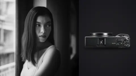 Ricoh GR IIIx product photo beside black and white profile portrait leaning against window